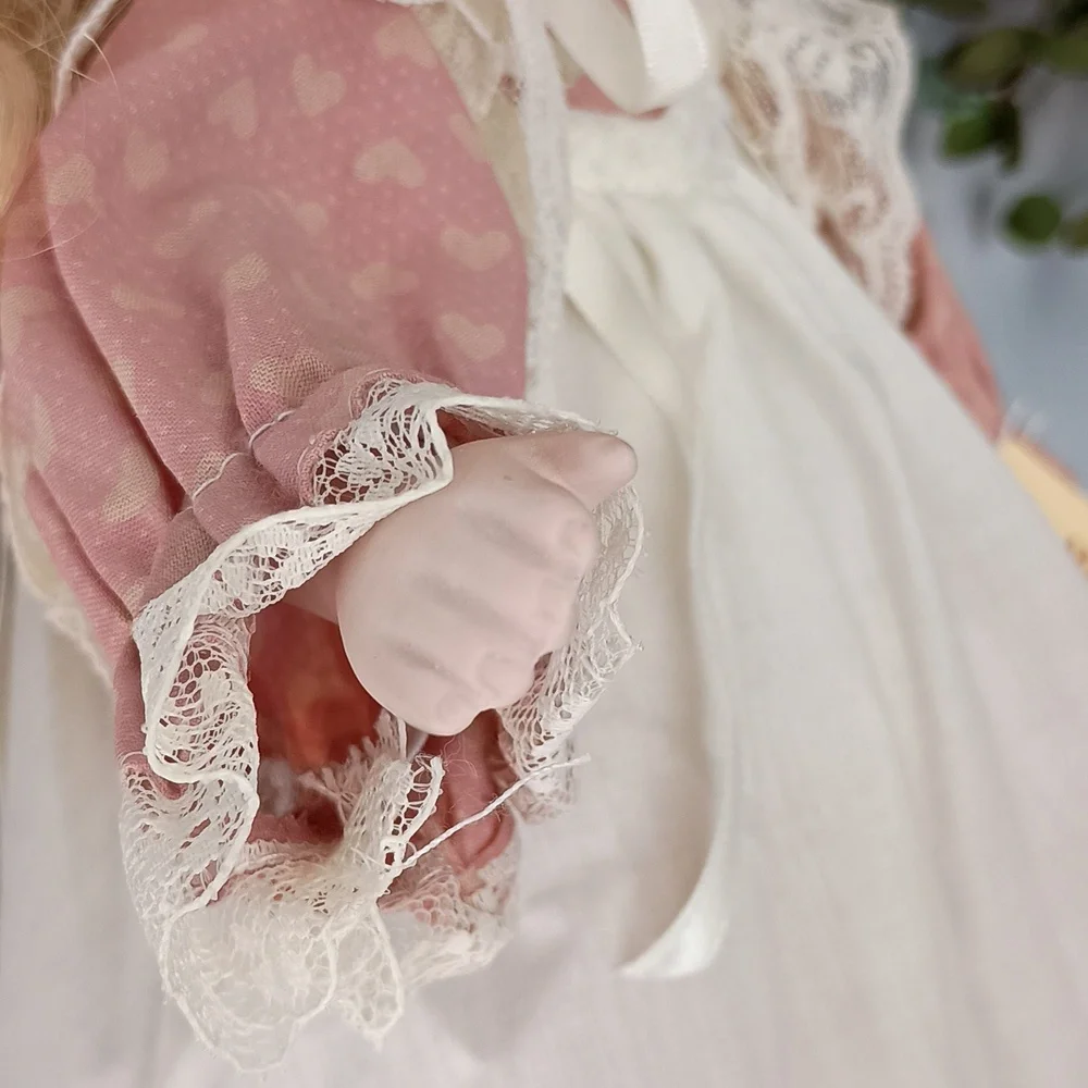 Vintage Porcelain Doll with Pink Dress and Bonnet by Dynasty Dolls